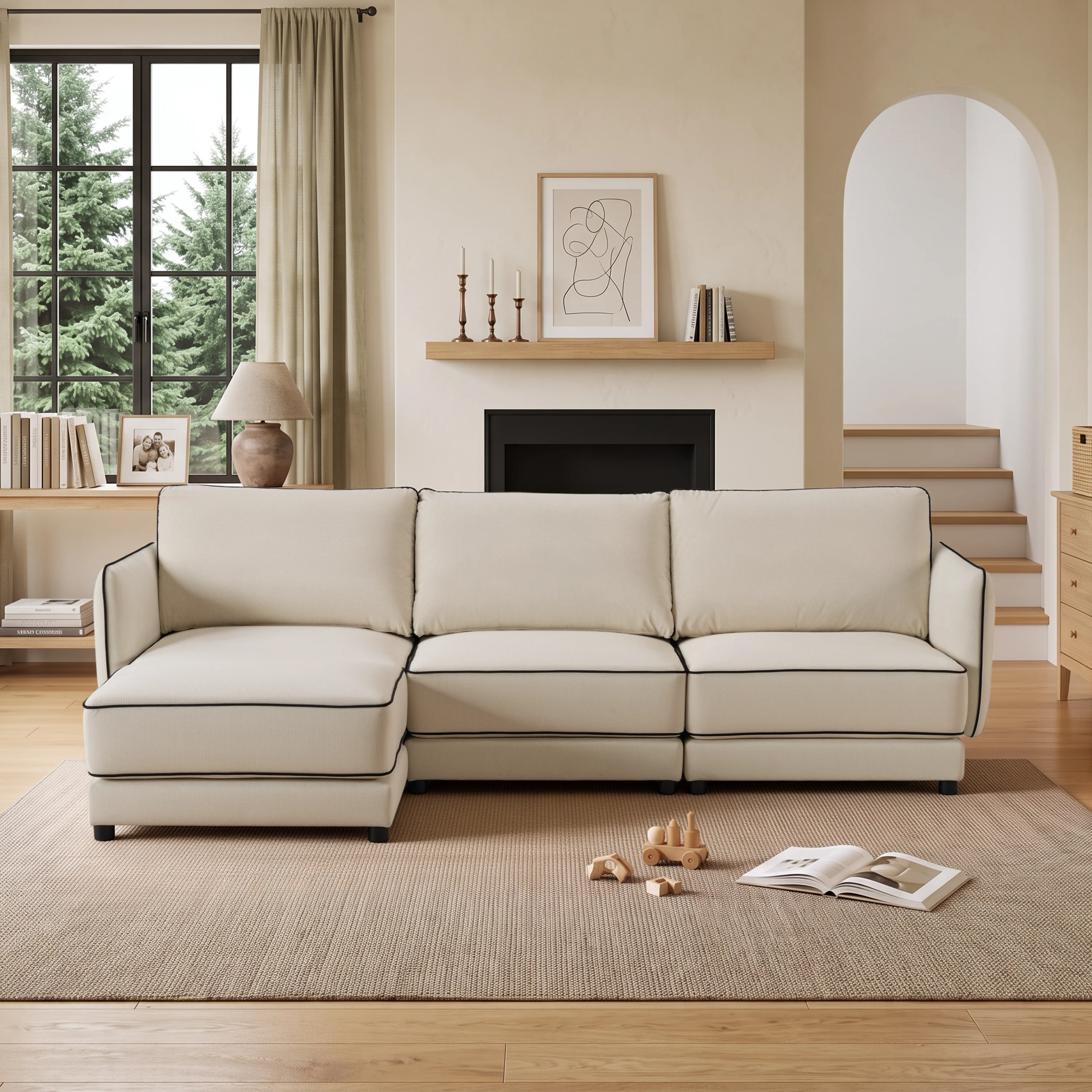 Cream modern sectional sofa with piped edges, reversible chaise, and 3 seat cushions