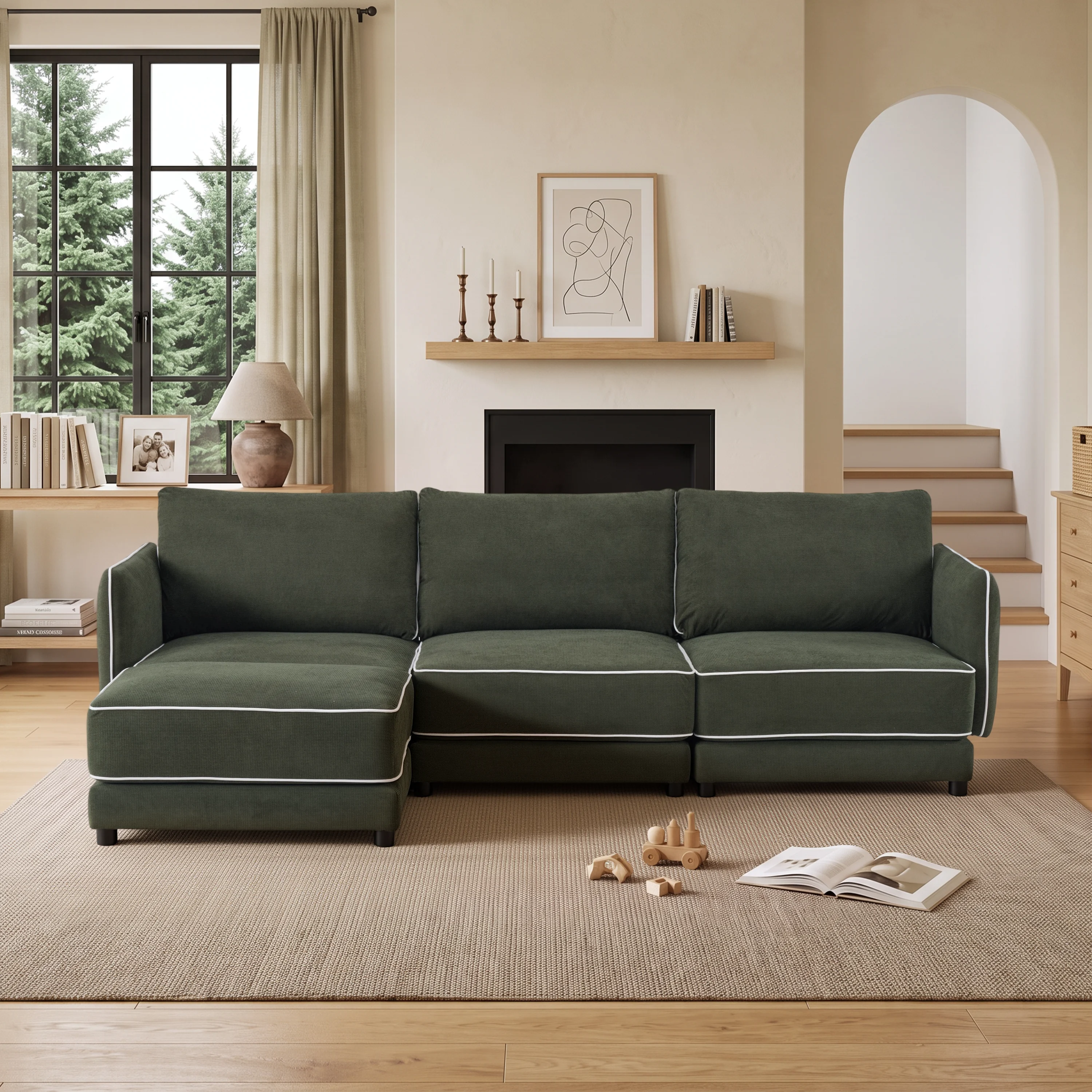 Green modern sectional sofa with piped edges, reversible chaise, and three seat cushions