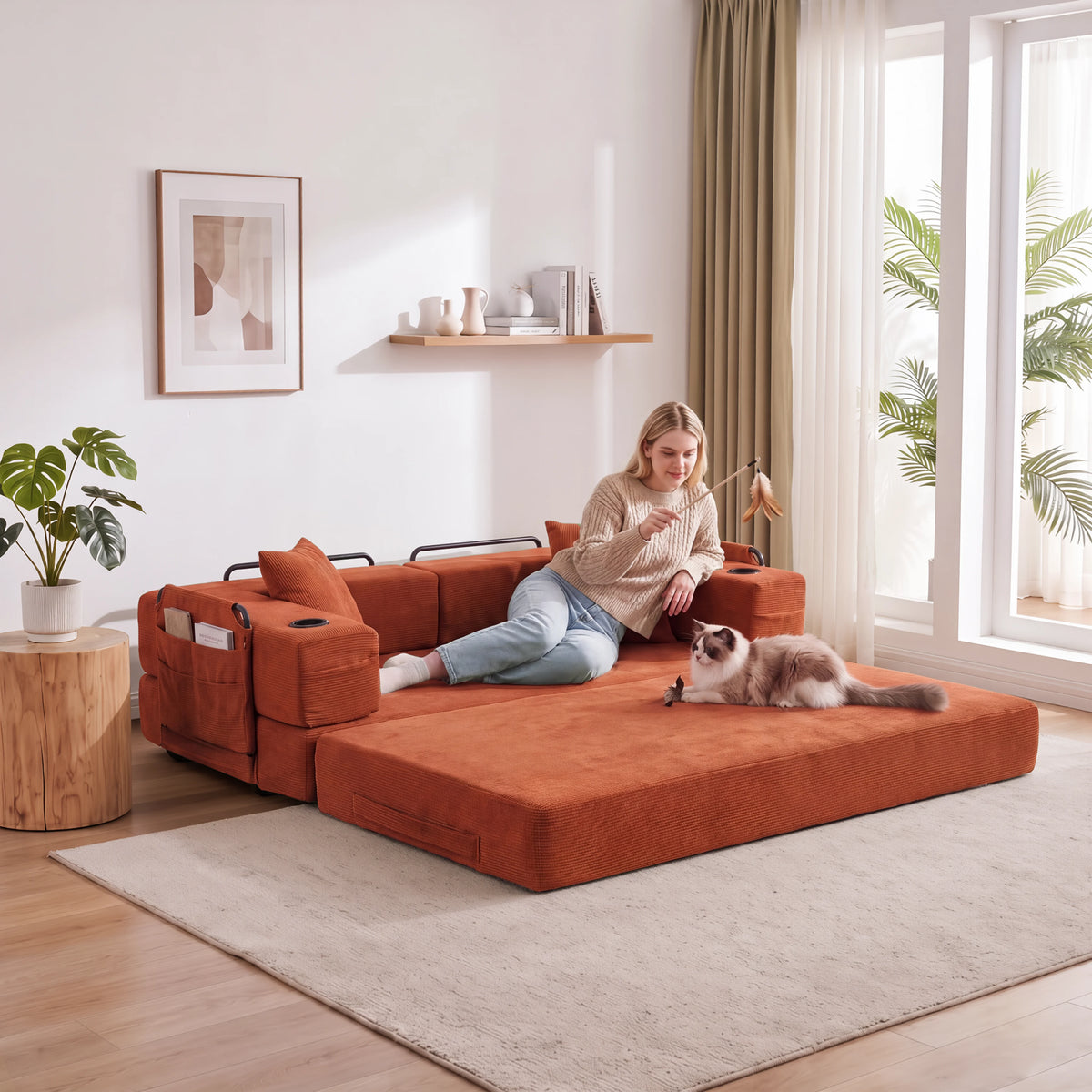 Orange compressed modular sofa with fold-out bed and two side storage blocks