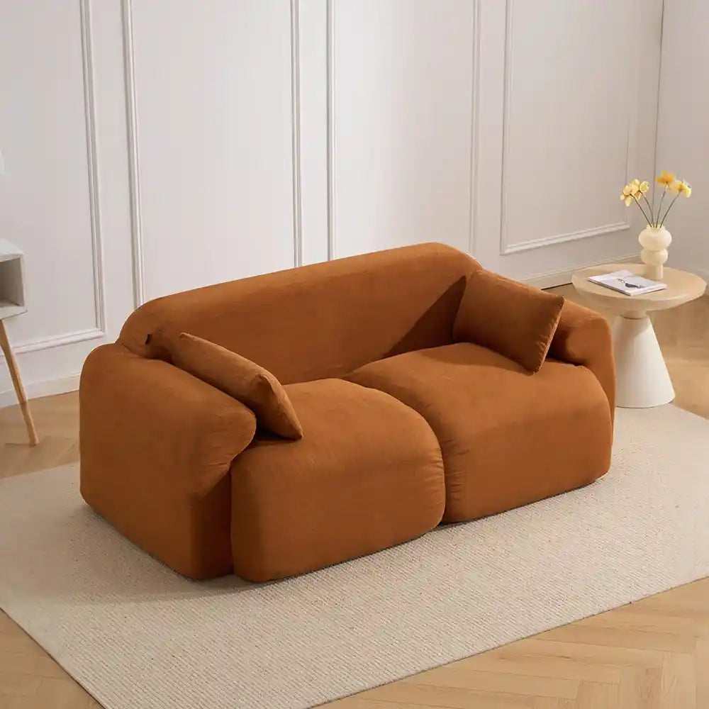 Burnt orange corduroy loveseat sofa with curved arms and two seat cushions