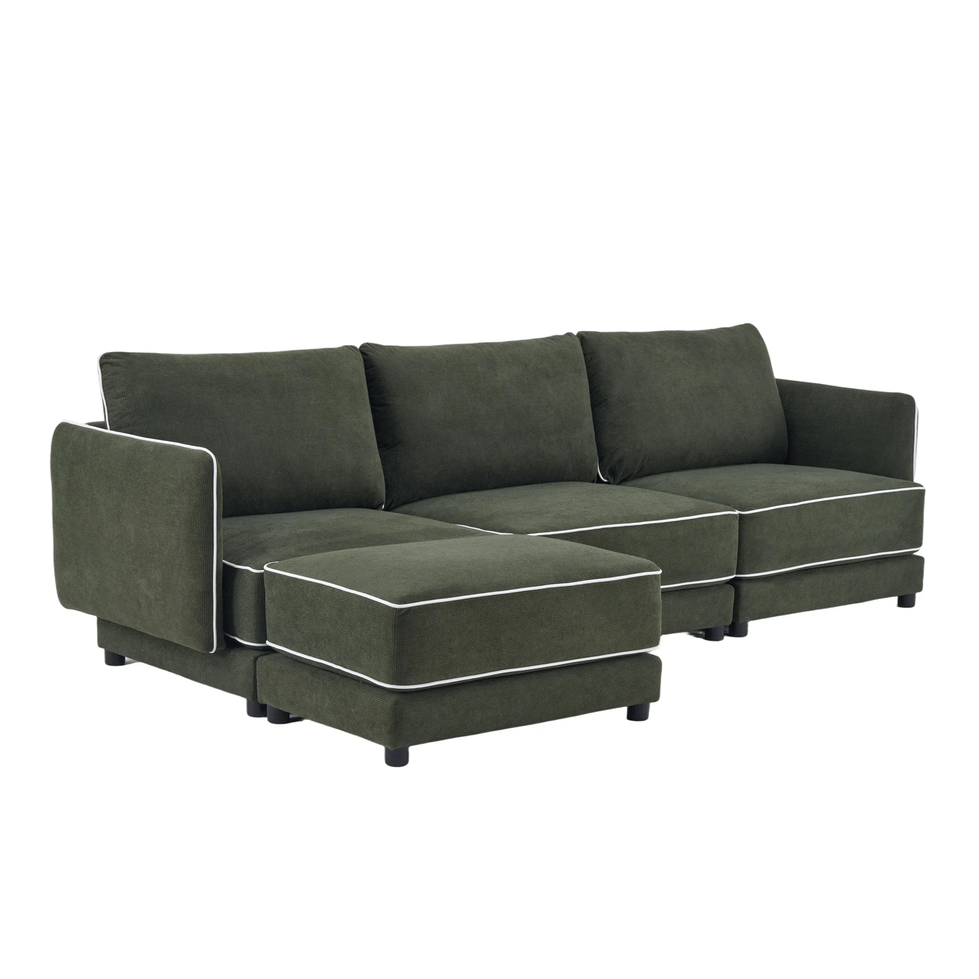 Green sectional sofa with chaise, piped edges, three-seat back cushions