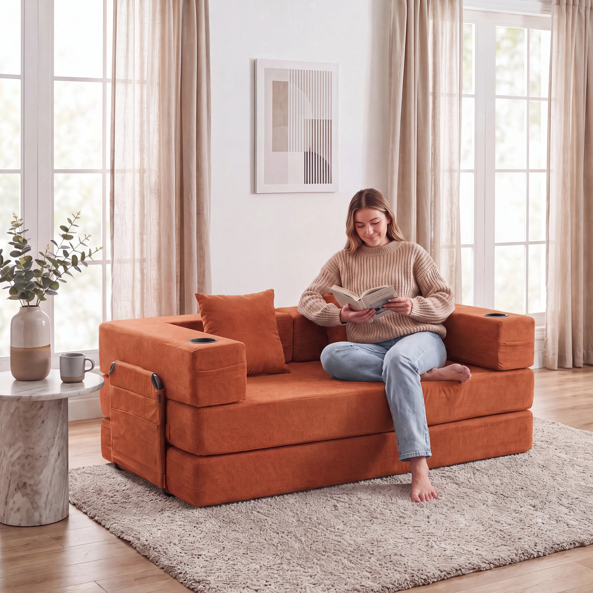 Orange modular sofa with padded seat, cube storage ottomans, and side arm cushions