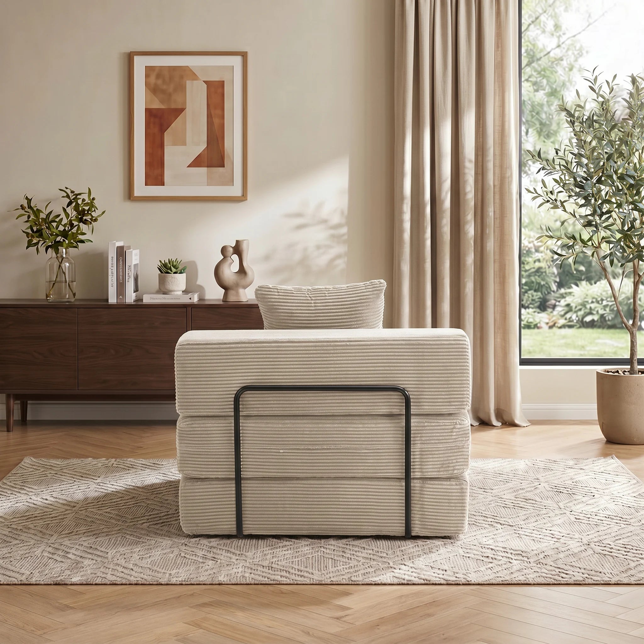 Single-seat sofa bed in light gray ribbed fabric, front view with metal handle