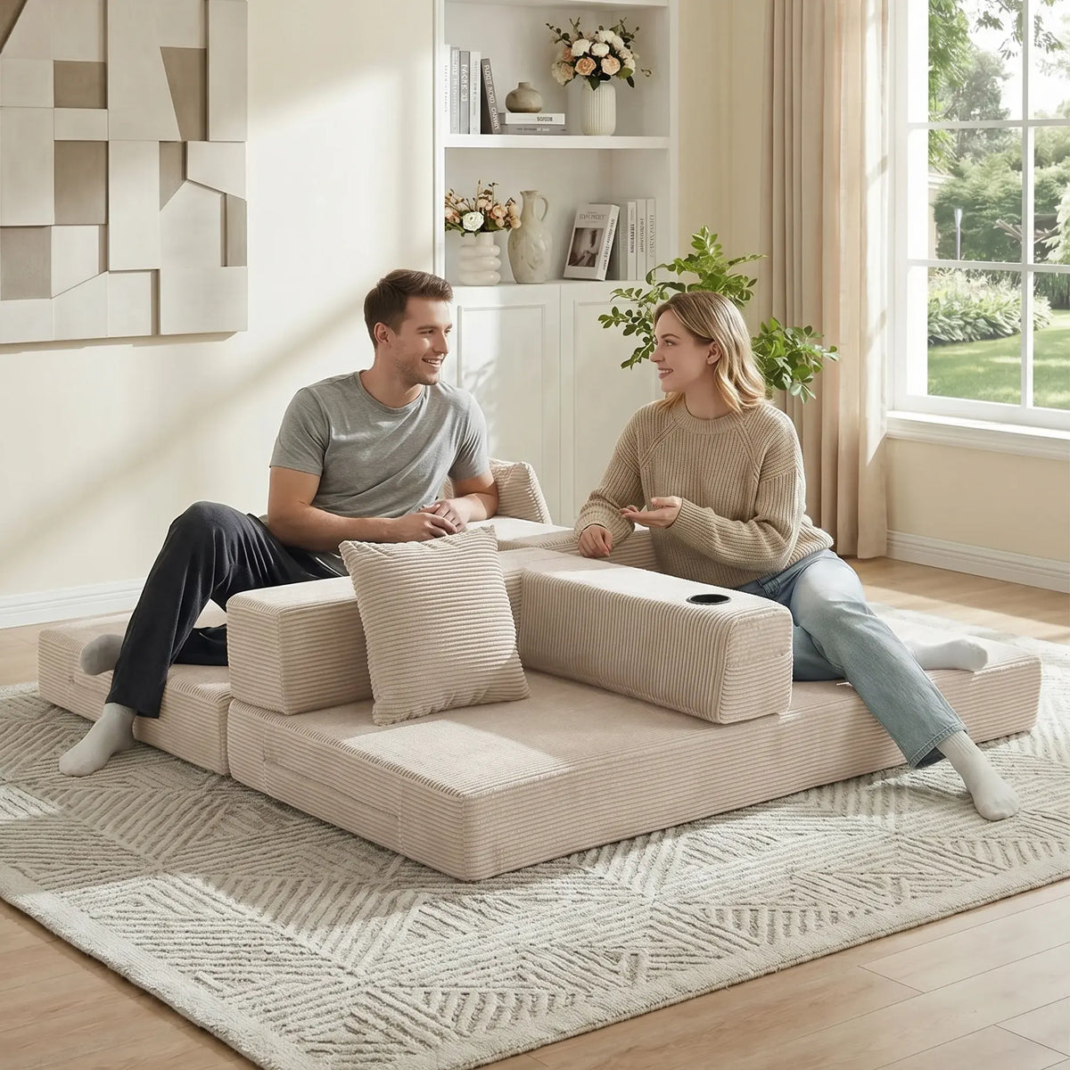 Cream modular sofa with chaise-style seat, two side storage compartments, black handles
