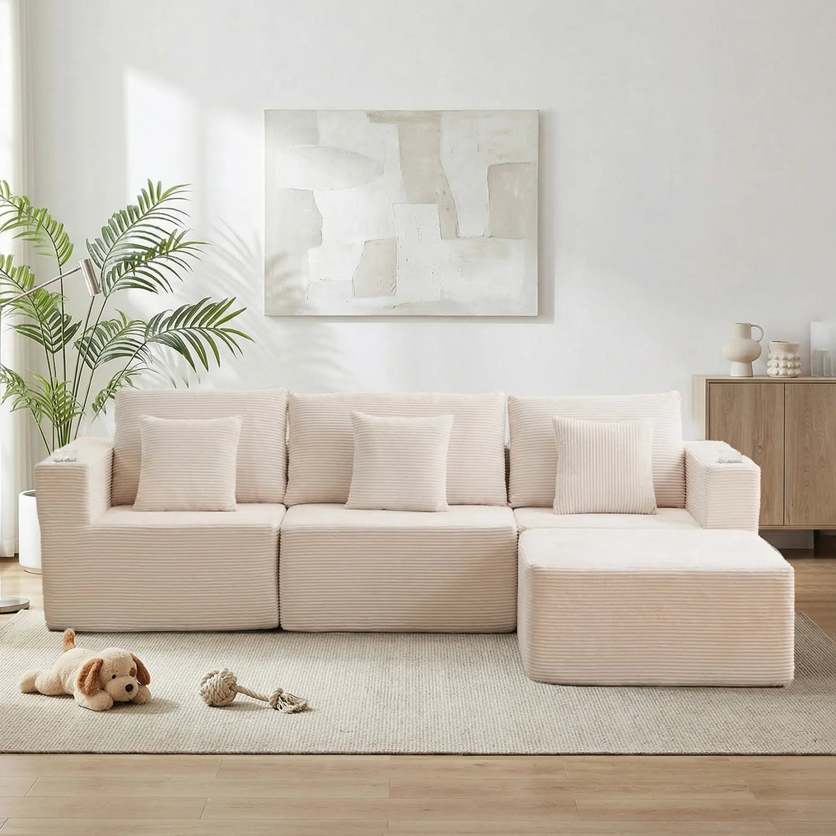 Cream modular sectional sofa with chaise and plush seat cushions