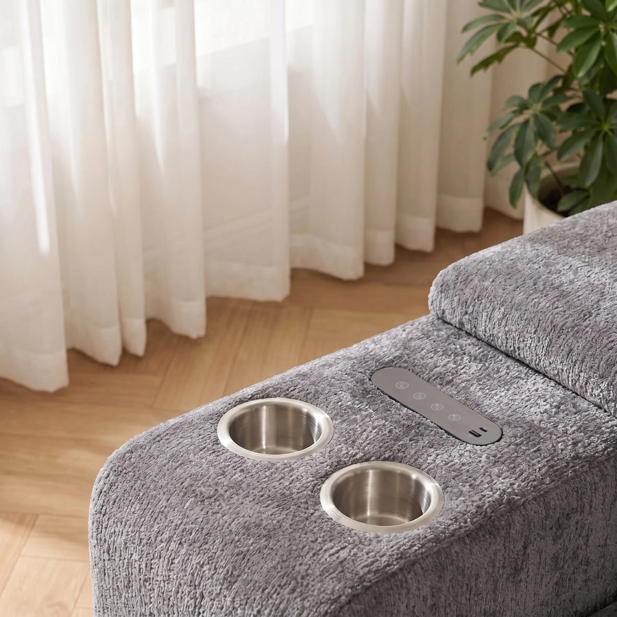 Grey fabric side table top with two metal cup holders and speaker control buttons