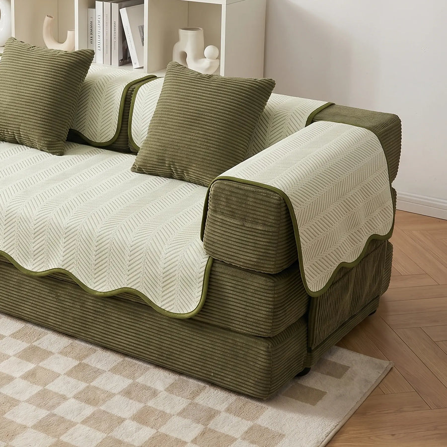Sofa pad set with cream seat cover and green arm and backrest pads