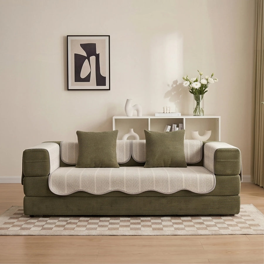 Sofa pad set with green base and cream cushion covers, textured chevron pattern
