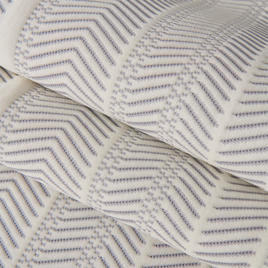 Sofa pad set fabric close-up: off-white with blue-gray zigzag lines and stitched texture