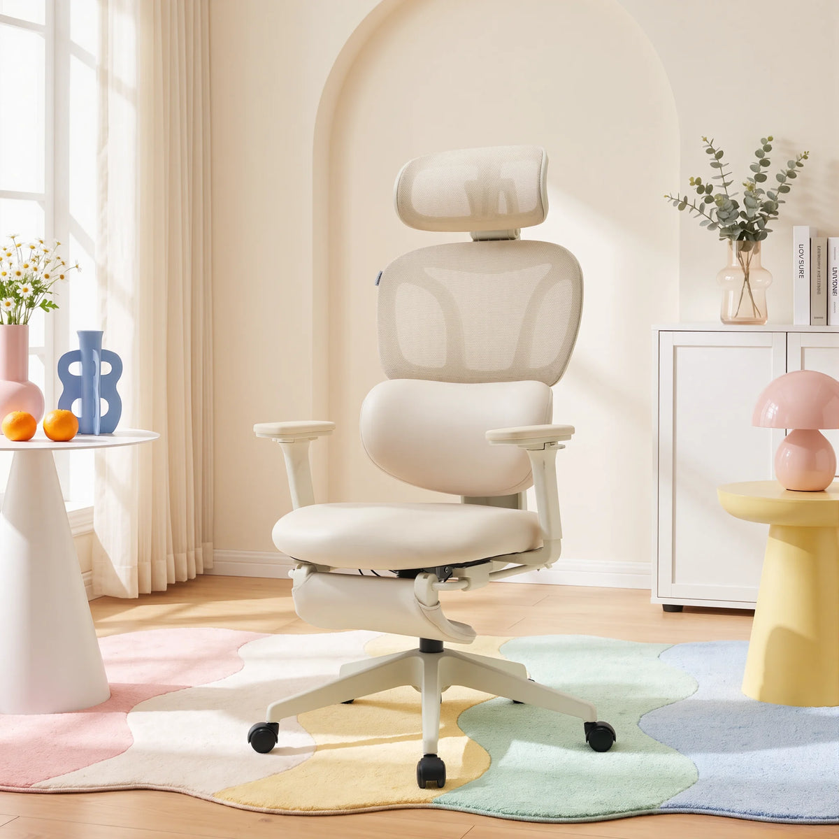 Cream ergonomic office chair with mesh back, headrest, and padded seat on wheels