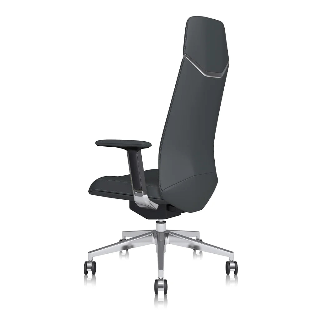 Dark gray leather office chair angled view, padded arms and seat, chrome star base, casters