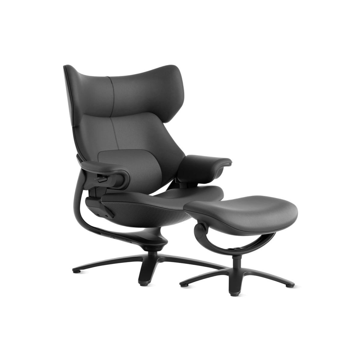 Black recliner lounge chair with ottoman, reclined seat and rounded backrest.
