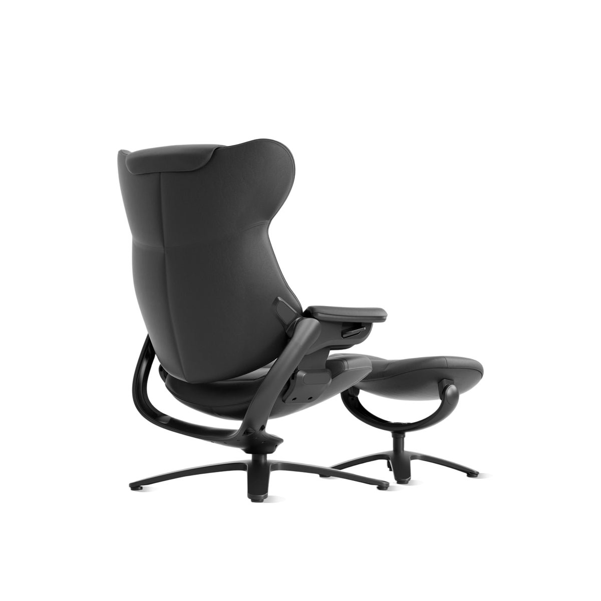 Black recliner lounge chair with ottoman, side view with curved armrests and swivel base